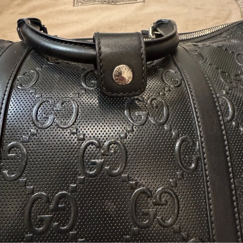 New! Gucci GG embossed black leather duffel bag